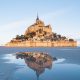 La plus belle photographie du Mont-Saint-Michel capture la majestueuse de l'île ainsi que l'architecture de style gothique de l'abbaye et le village médiéval qui l'entoure.